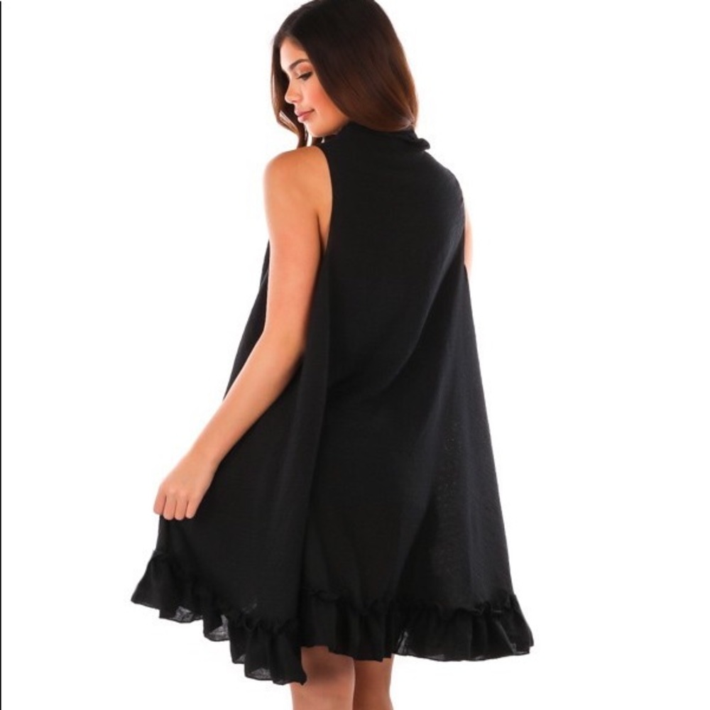 Swing vest with ruffle accent